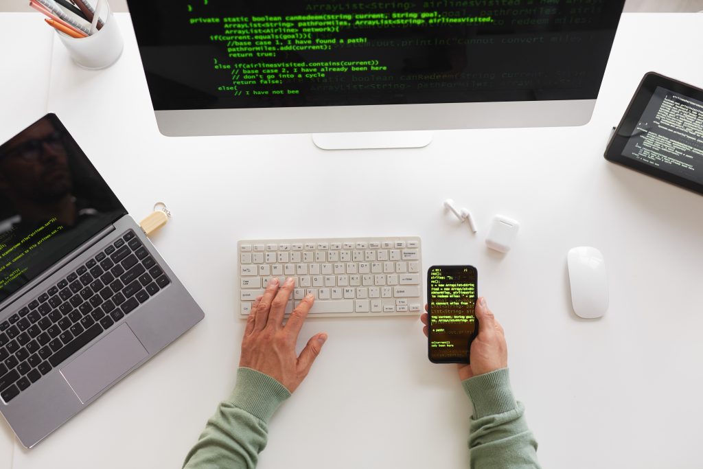 Programming website design. Application Software, Banking, Business, Businessman, Buying, Communication, Computer, Computer Keyboard, Computer Monitor, Concepts, Connection, Data, Desk, Digital Tablet, E-Mail, E-commerce, Equipment, Holding, Human Hand, Information Medium, Internet, Laptop, Marketing, Men, Mobile Phone, Mobility, Modern, Occupation, Office, PC, Paying, People, Smart Phone, Table, Technology, Telephone, Typing, Web Page, Wireless Technology, Working, Software, System, Coding, Developer, Programmer, Programming.